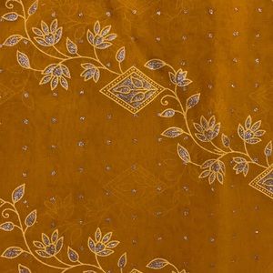 Stunning mustard colored sari. No blouse.